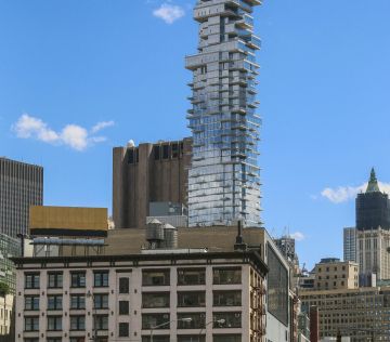 Spectacular view of Manhattan skyline featuring modern skyscrapers and vibrant city life.