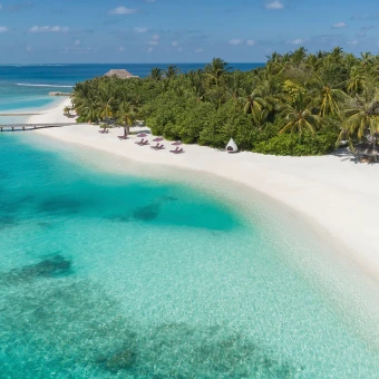 wp-content/uploads/2025/10/Naladhu_Private_Island_Aerial_Jetty_Beach.webp