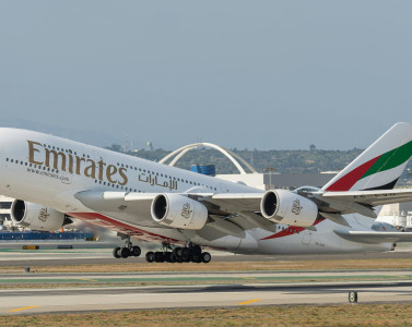 Emirates jetliner at Dubai airport runway
