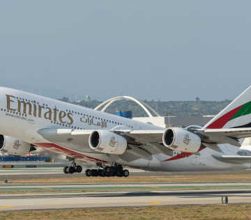 Emirates jetliner at Dubai airport runway