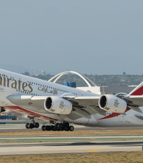 Emirates jetliner at Dubai airport runway