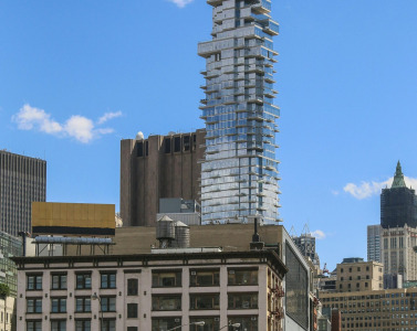Spectacular view of Manhattan skyline featuring modern skyscrapers and vibrant city life.