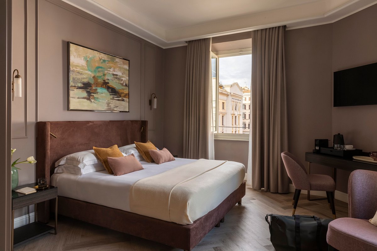 wp-content/uploads/2026/03/nomos-hotel-rome-guestroom-1.jpg
