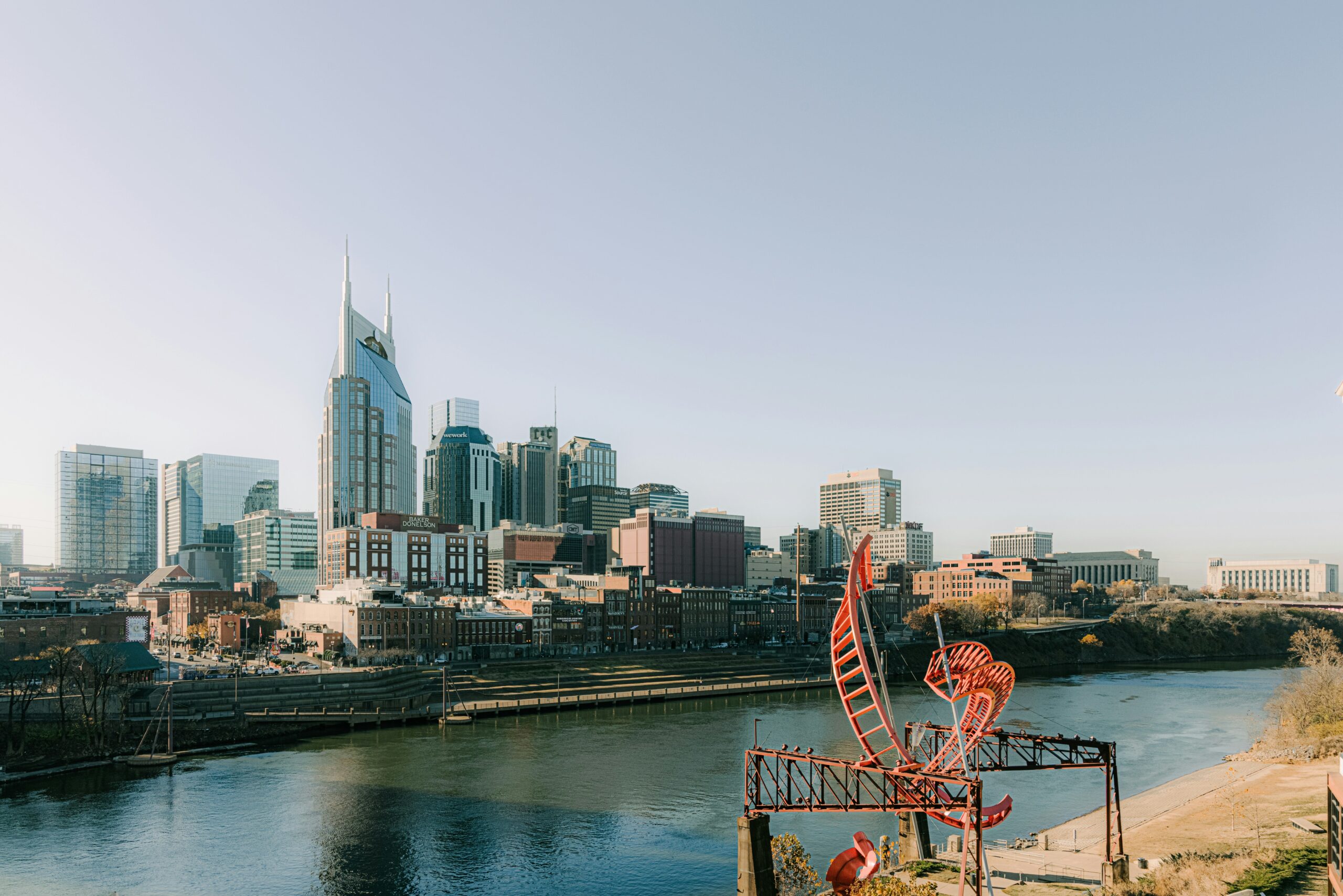city skyline near body of water during daytime