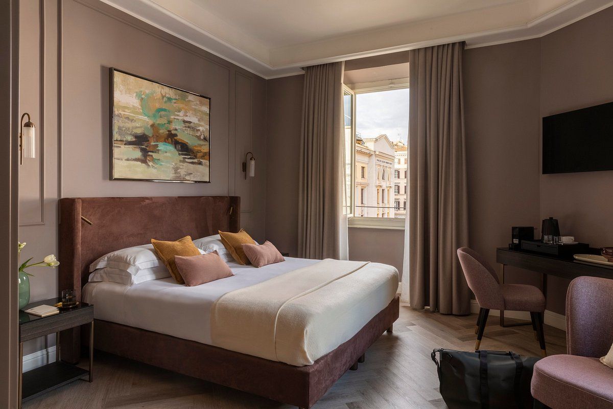 wp-content/uploads/2026/03/nomos-hotel-rome-guestroom-1.jpg