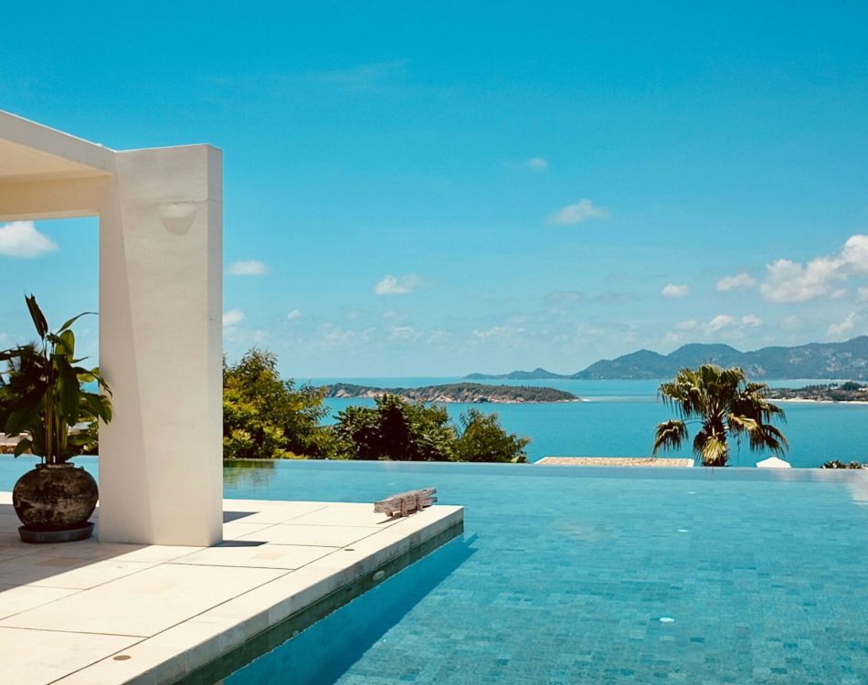 brown wooden house near green trees during daytime