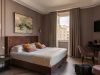 wp-content/uploads/2026/03/nomos-hotel-rome-guestroom-1.jpg