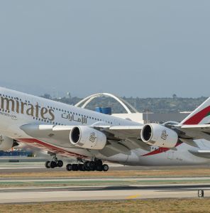 Emirates jetliner at Dubai airport runway