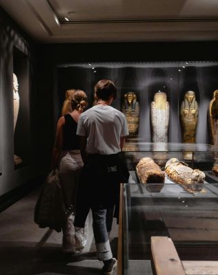 room with egyptian paintings on the walls