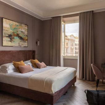wp-content/uploads/2026/03/nomos-hotel-rome-guestroom-1.jpg